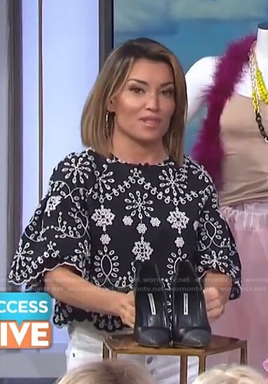 Kit’s black eyelet scalloped top on Access Hollywood