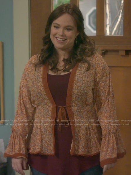 Kristin’s orange floral tassel tie top on Last Man Standing