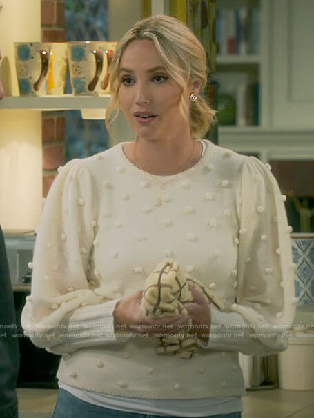 Mandy’s ivory pom pom sweater on Last Man Standing