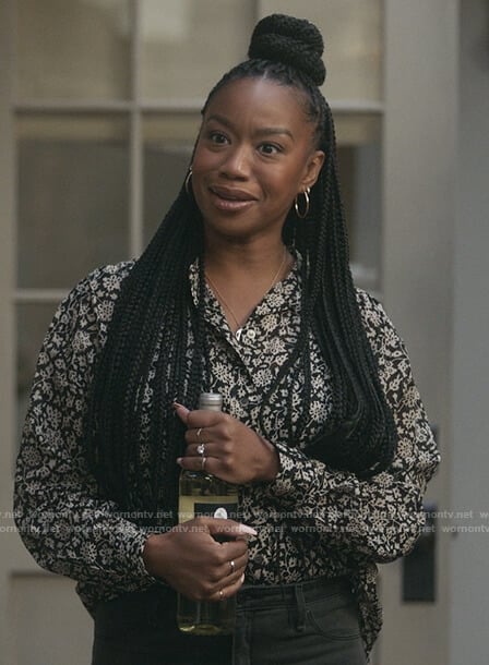 Michelle’s black floral print blouse on The Unicorn