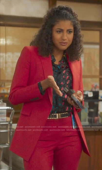 Mikaela’s red suit and multi colored leopard shirt on Mr Mayor