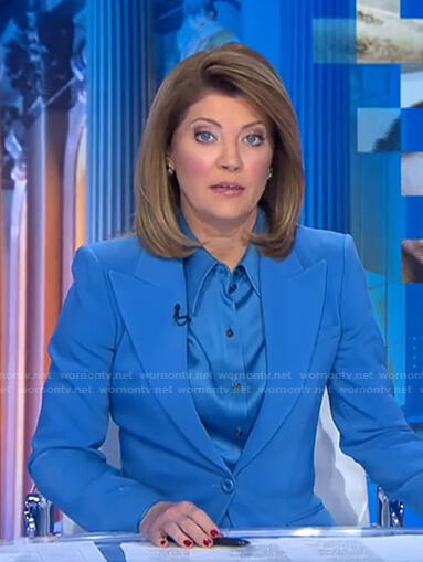 Norah’s blue satin shirt and peak lapel blazer on CBS Evening News