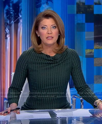 Norah’s green cowl neck dress on CBS Evening News