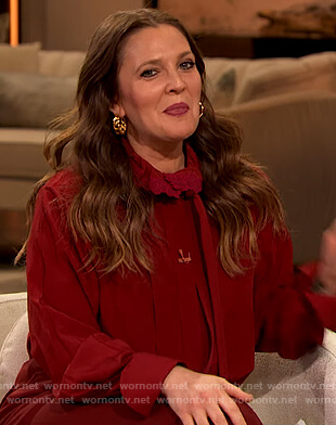 Drew’s red tie neck blouse on The Drew Barrymore Show