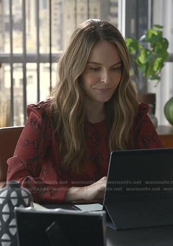 Izzy’s red snake print blouse on Bull