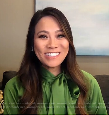 Sandra Lee’s green satin tie neck blouse on E! News