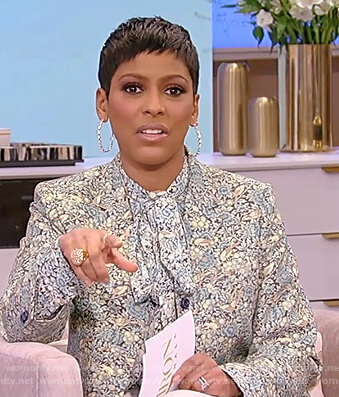 Tamron’s green floral print blouse and blazer on Tamron Hall Show