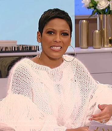 Tamron’s white crochet feather trim sweater on Tamron Hall Show