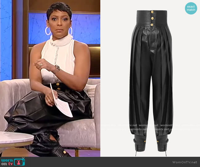 Gucci Pleated leather tapered pants worn by Tamron Hall on Tamron Hall Show