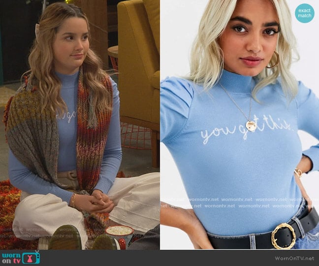 River Island Petite puff sleeve slogan sweater in blue worn by Lex (Jules LeBlanc) on Side Hustle