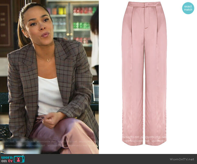 Vince Blush wide-leg satin trousers worn by Emily Lopez (Jessica Camacho) on All Rise