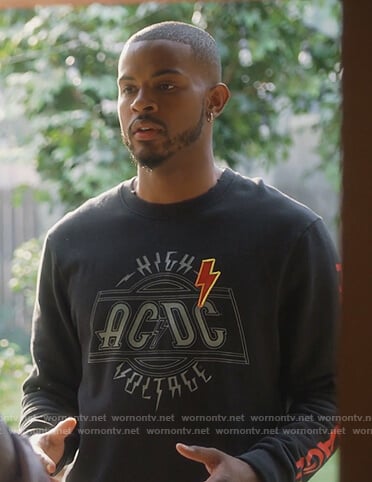 Aaron’s black AC DC sweatshirt on Grown-ish