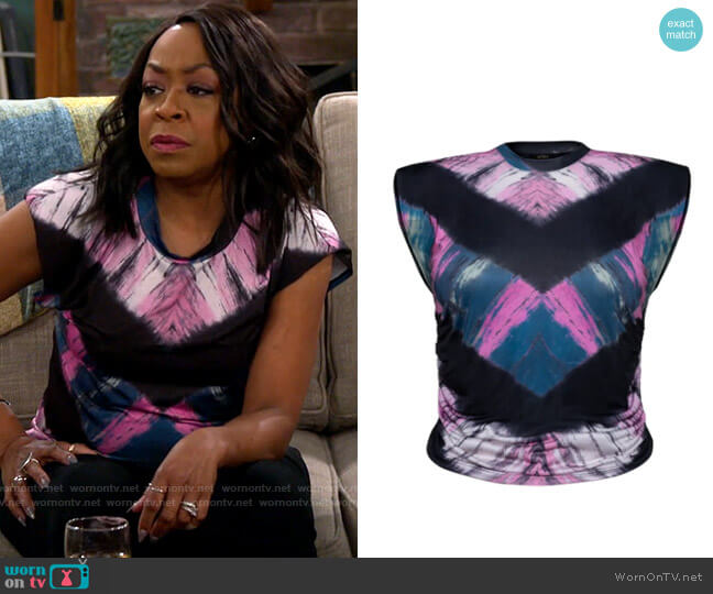 AFRM Scorpio Cap Sleeve Crop Top in Pink / Navy Chevron Tie Dye worn by Tina Butler (Tichina Arnold) on The Neighborhood