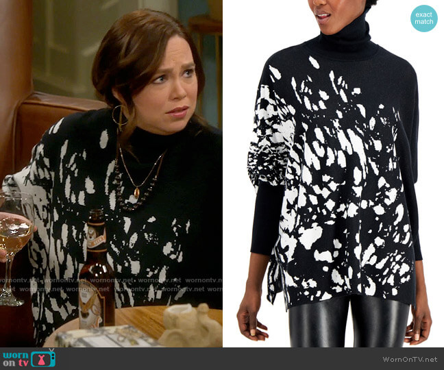 Alfani Printed Drop-Shoulder Turtleneck Sweater in Black White Splatter worn by Kristin Baxter (Amanda Fuller) on Last Man Standing
