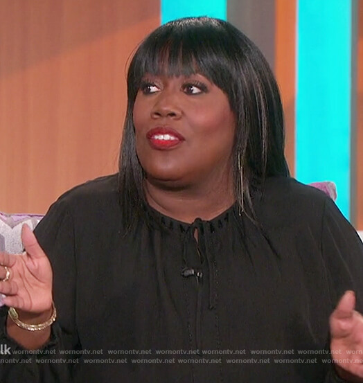 Sheryl’s black keyhole blouse on The Talk
