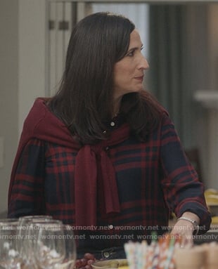 Delia’s navy plaid shirt on The Unicorn