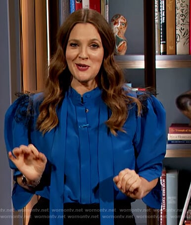 Drew’s blue lace trim tie neck blouse on The Drew Barrymore Show
