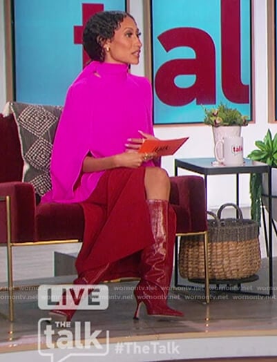 Elaine’s pink tie neck blouse and red skirt on The Talk