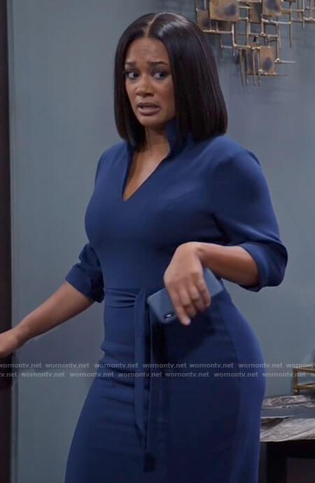 Fatima’s navy blue v-neck dress on Tyler Perrys Sistas
