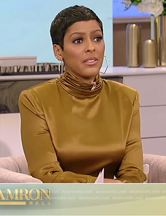 Tamron’s gold metallic top on Tamron Hall Show
