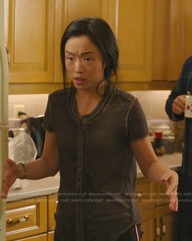 Janet’s black henley tee on Kims Convenience