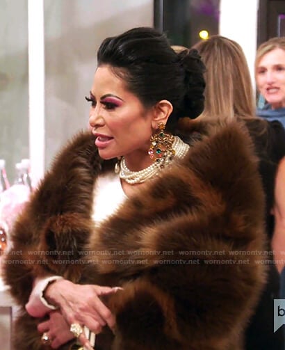Jen’s GG logo print fur jacket and earrings on The Real Housewives of Salt Lake City
