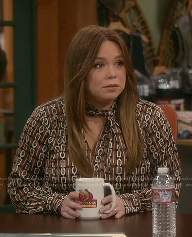 Kristin’s geometric print tie neck dress on Last Man Standing