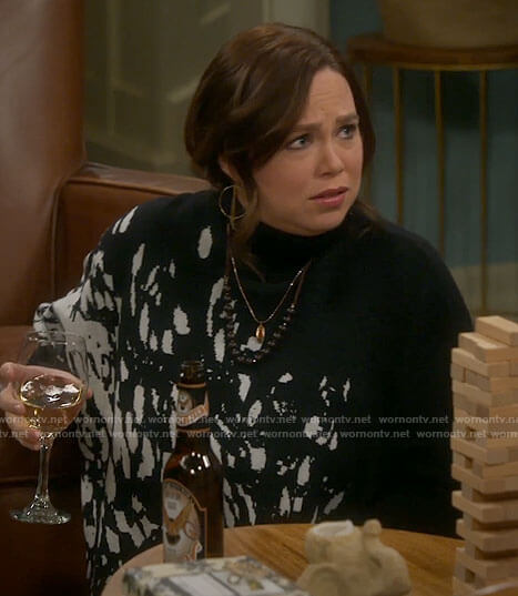 Kristin’s black splatter print turtleneck sweater on Last Man Standing