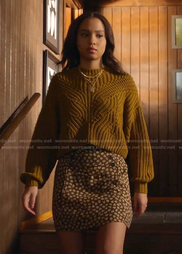 May’s yellow ribbed sweater and brown floral skirt on 9-1-1