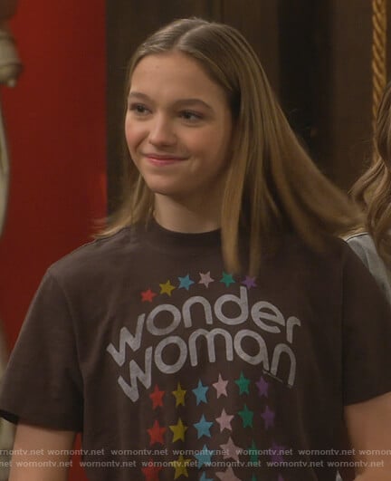 Pressley’s black wonder woman star tee on Side Hustle