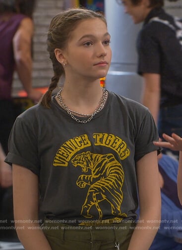 Presley’s black Vince Tigers graphic tee on Side Hustle