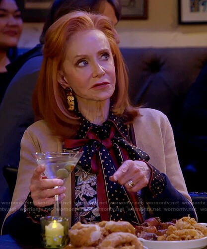 Sheila’s floral and polka dot tie neck blouse on Call Me Kat