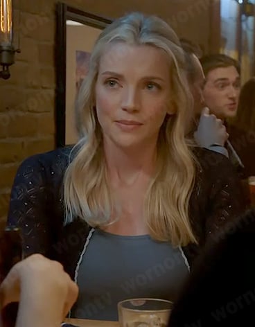 Sylvie’s navy pointelle cardigan with scalloped trim on Chicago Fire