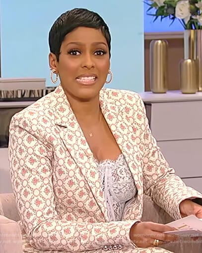 Tamron’s floral blazer with lace bustier top on Tamron Hall Show