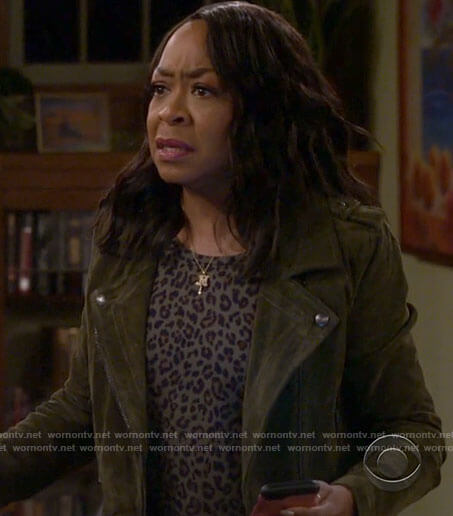 Tina’s green suede moto jacket on The Neighborhood