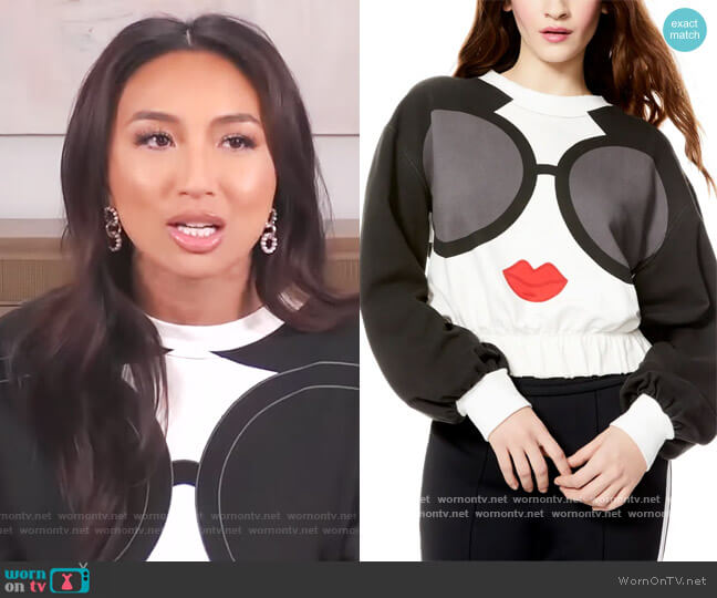 Alice + Olivia Gaia Graphic Blouson Crop Sweatshirt worn by Jeannie Mai on The Real