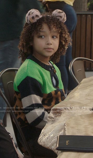 Bridget’s green, leopard, and stripe sweater on Kenan