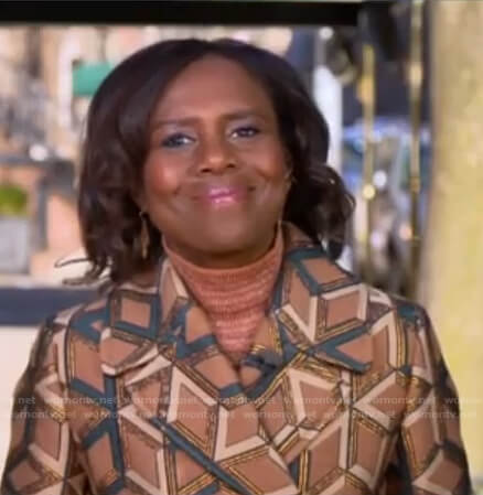 Deborah’s metallic turtleneck sweater and coat on Good Morning America