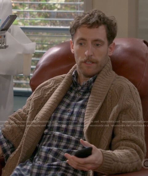 Drew’s plaid shirt and brown cable knit cardigan on B Positive