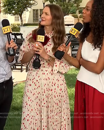 Drew’s floral print blouse and pleated skirt on The Drew Barrymore Show
