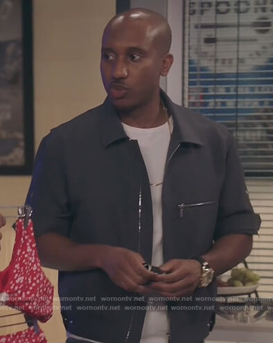 Gary’s gray zip down shirt on Kenan