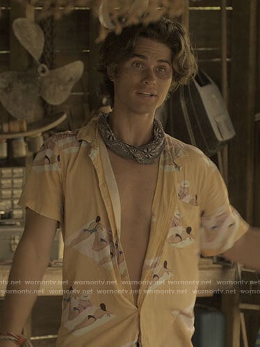 John B’s yellow sunbakers shirt on Outer Banks