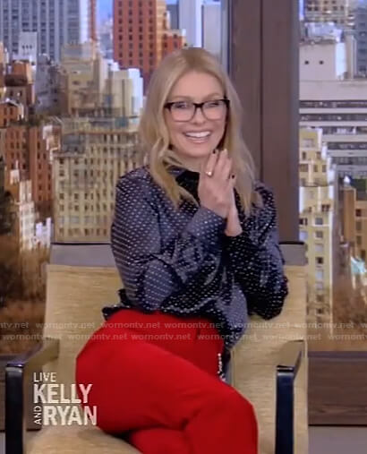 Kelly’s studded blouse and red pants on Live with Kelly and Ryan