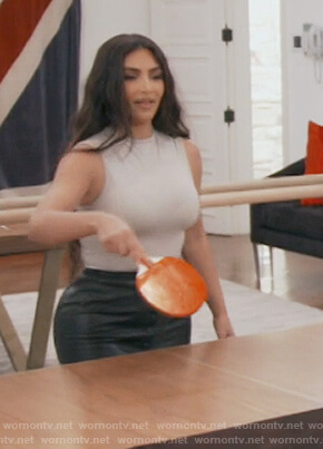 Kim’s white crew neck bodysuit on Keeping Up with the Kardashians