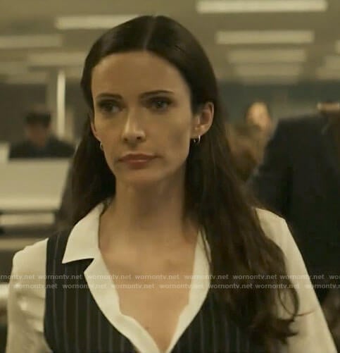 Lois’s white blouse and pinstriped vest on Superman and Lois