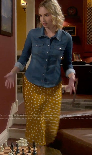 Mandy’s denim shirt and yellow polka dot midi skirt on Last Man Standing