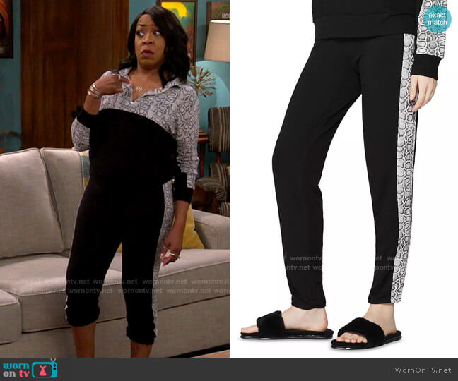 Monrow Snakeskin Print Sweatpants worn by Tina Butler (Tichina Arnold) on The Neighborhood