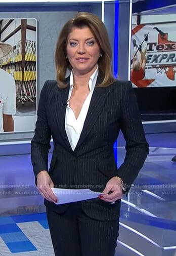 Norah’s metallic pinstripe blazer and pant suit on CBS Evening News