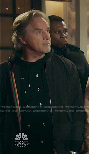 Rick’s black embroidered number hoodie and colorblock bomber jacket on Kenan
