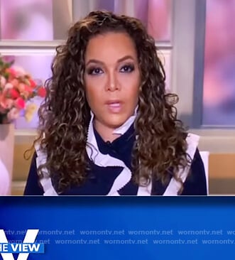 Sunny’s navy ruffled blouse on The View